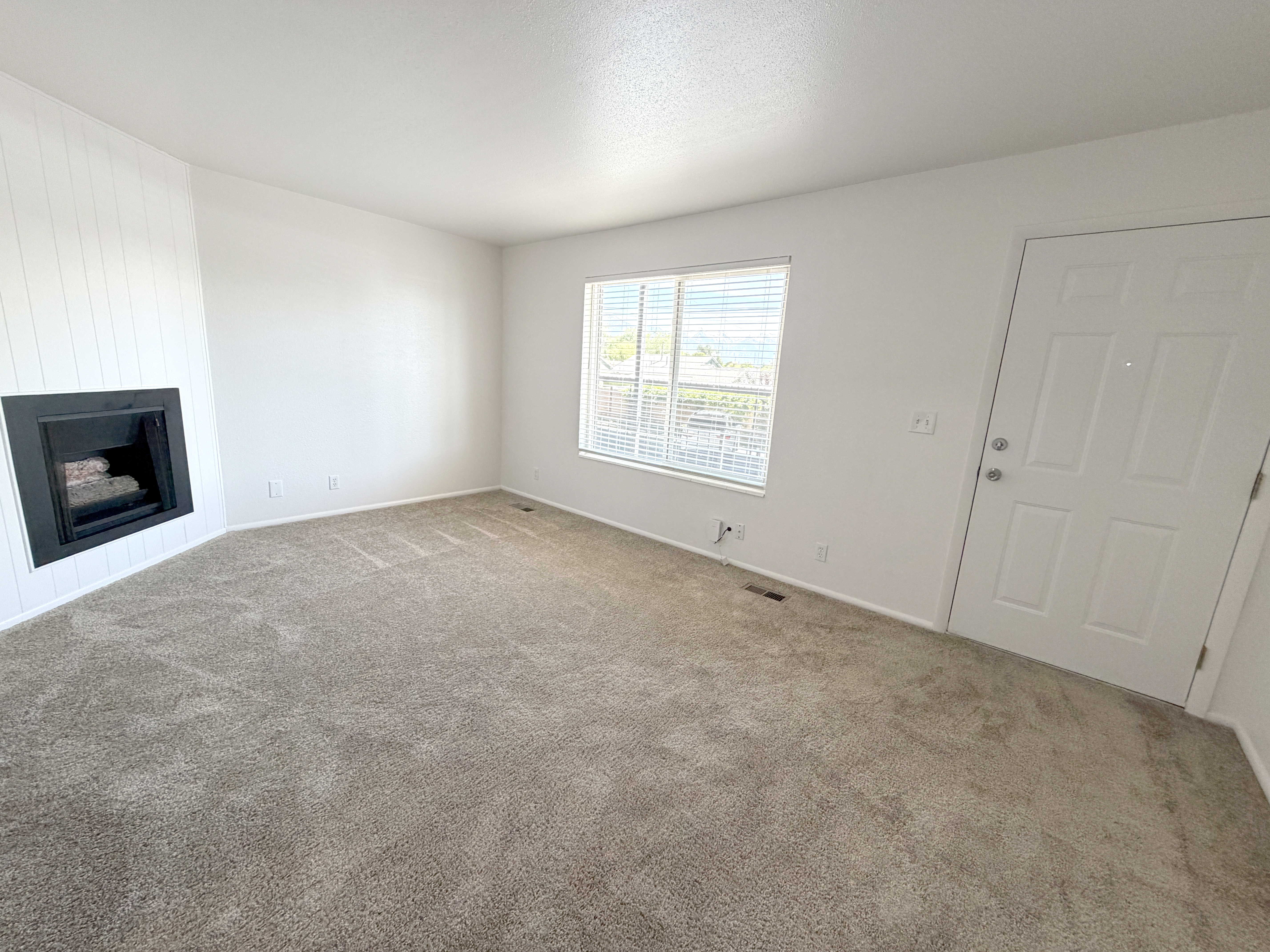 Spacious living room with fireplace